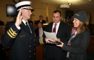 Middletown Mayor Tony Fiore administers the Oath of Office to Fire Chief Michael Chenoweth