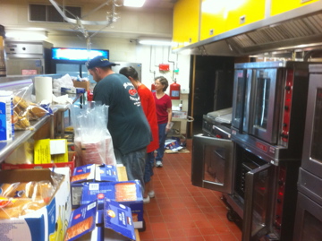 Salvation Army volunteers preparing meals at Holmdel High School shelter.  200 lunches and 500 dinners were served today.  Photo credit: John Gallagher, a Salvation Army volunteer.