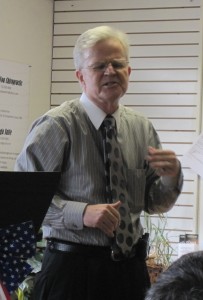 Former Lousiana Governor Buddy Roemer dances with a question from a Bayshore Tea Party Group member.