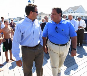 Belmar Mayor Matt Doherty, left, and Governor Chris Christie, on the Belmar boardwalk last summer. Freeholder Director John Curley, the the background, right, will not be challenged by Doherty this November.