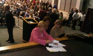 County Clerk Claire French, left, Hedra Siskel, Supt of Election and Bertha Sumick double check the tally