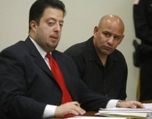 Ruben Scolavino, left and his client, former Corrections Officer Luis Roman, as he pleads guilty to smuggling phones and drugs into prisons. Star Ledger photo