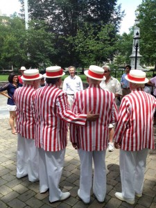 Rush Holt taking in a Barber Shop quartet in Morristown