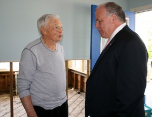 Thomas P. Largey, 82, and Senate President Steve Sweeney talk in Largey's gutted living room prior to Sweeney's press conference. May 30, 2014. Photo by Art Gallagher