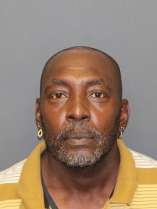 Brian R. Farmer's mugshot taken August 6, 2014, one week after the murders of Joan Colbert and Veronica Roach, for which he is accused.