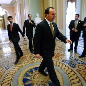 U.S. Senator Mike Lee, R-Utah, walks to the Senate floor during a long series of votes, many on procedural matters or to confirm members of the Obama administration, at the U.S. Capitol in Washington Dec. 13, 2014.Reuters/Jonathan Ernst