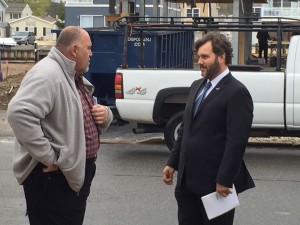 Brent Sonnek-Schmelz, right meets George Kasimos, leader of Stop FEMA now, outside his Sandy ravaged home