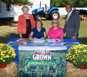 Freeholder Lillian Burry, Anna Trapani, Vice President and Robin Bruins, Secretary, of the Monmouth County Board of Agriculture and Freeholder Director Tom Arnone