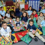 DiMaso distributes sackpacks to Freehold Learning Center students